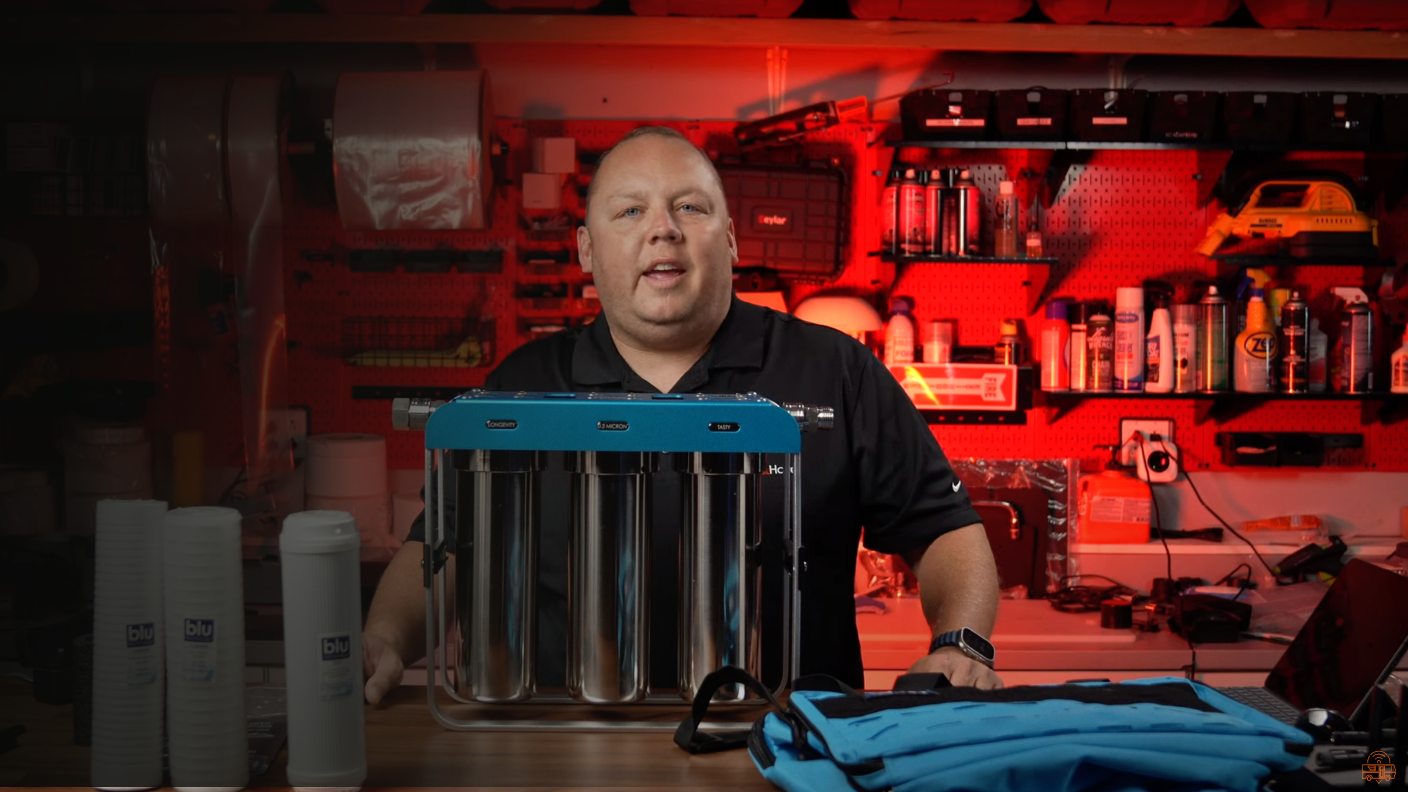 Erik standing behind the AR3 XLT water filtration unit 